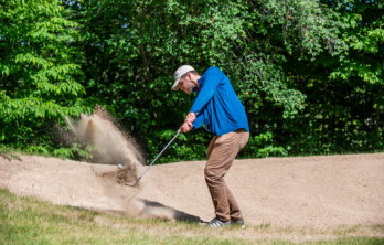 This is a picture of a guest playing golf at Beaver Creek Resort in Gaylord, MI