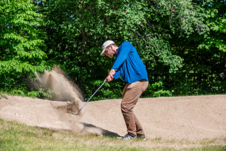 This is a picture of a guest playing golf at Beaver Creek Resort in Gaylord, MI